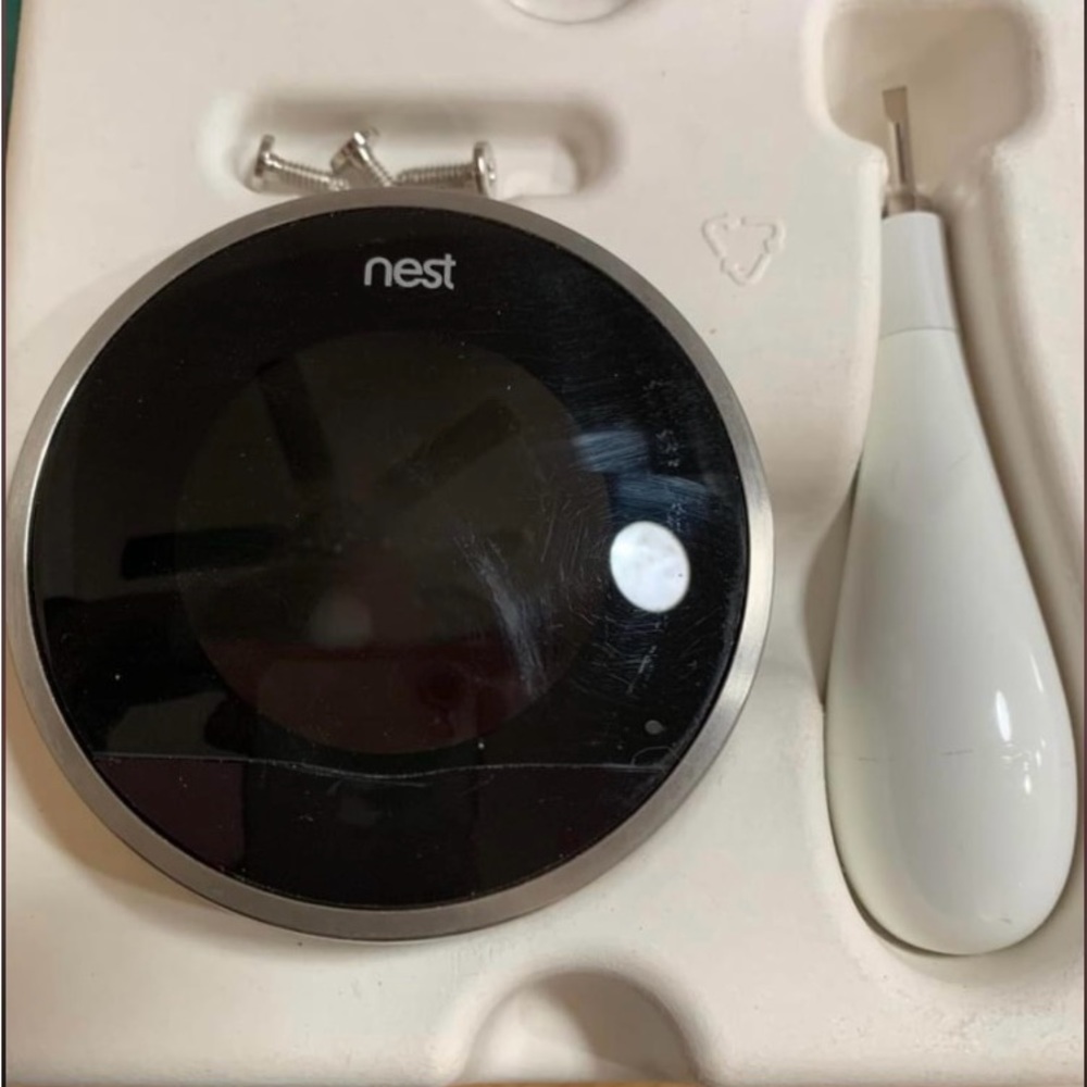 Nest Programmable thermostat. WiFi enabled.